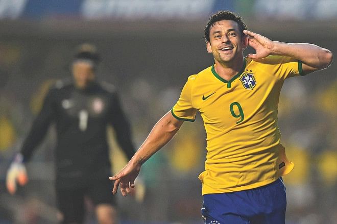 Brazil striker Fred celebrates his all-important goal against Serbia during their international friendly in Sao Paulo on Friday. Photo: AFP