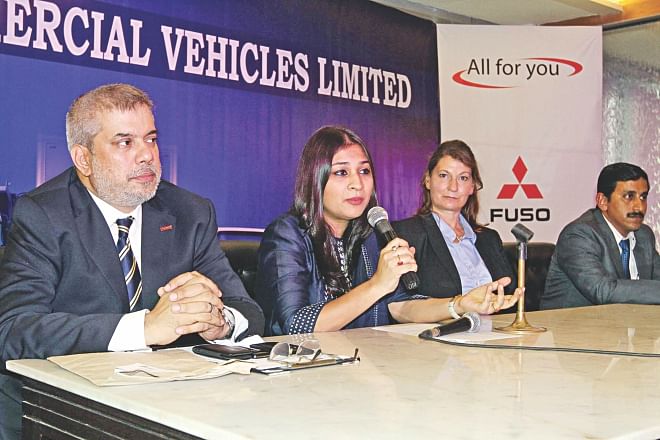 Left, Sohana Rouf Chowdhury, managing director of Ranks Commercial Vehicles, speaks at the launch of Fuso trucks of Daimler India Commercial Vehicles, at Rangs Bhaban in Dhaka yesterday.  Photo: Star