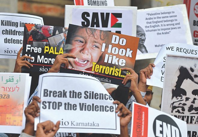 Members of the Students' Islamic Organisation hold placards during a protest against the bombing of Gaza by Israel in Bangalore yesterday. Photo: AFP