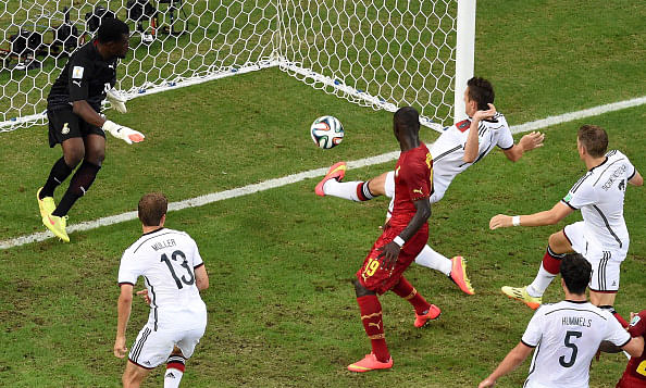 Germany's forward Miroslav Klose (topR) scores during a Group G football match between Germany and Ghana at the Castelao Stadium in Fortaleza during the 2014 FIFA World Cup on June 22, 2014.Photo: Getty Images