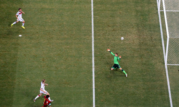 Asamoah Gyan of Ghana scores his team's second goal past goalkeeper Manuel Neuer of Germany during the 2014 FIFA World Cup Brazil Group G match between Germany and Ghana at Castelao on June 22, 2014 in Fortaleza, Brazil. Photo: Getty Images