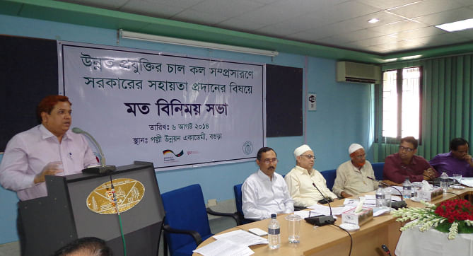 Taposh Kumar Roy, additional secretary of power, speaks at a view exchange meeting on new system of parboiling rice organised by the government, Bangladesh Bank, and German development agency GIZ in Bogra yesterday. Photo: Star