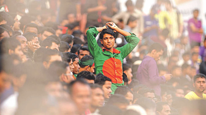 It was an anticlimactic finish to a euphoric build-up of Bangladesh's opening match against Malaysia at the Sylhet District Stadium yesterday. Here dejection is the dominating mood in the stands for the home side's 1-0 defeat. PHOTO: FIROZ AHMED