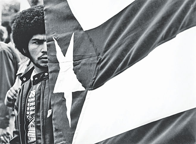 One of Frank's most famous photographs - Puerto Rican rally, 1973.  