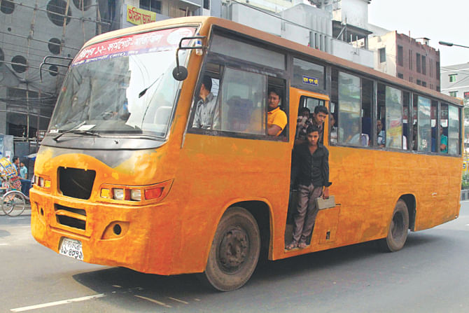 A newly painted bus plying a street in Mirpur-10. Photo: Amran Hossain