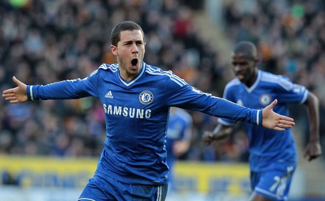 Chelsea winger Eden Hazard celebrates his opening goal of the Premier League match against Hull City at the KC Stadium yesterday. Photo: AFP
