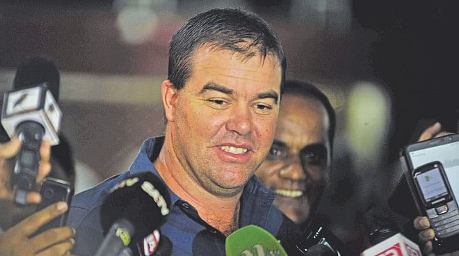 Former Zimbabwe fast bowler and new Bangladesh bowling coach Heath Streak gives a weary smile after surprising the media contingent by greeting them with 'Assalamu Alaikum' upon his arrival at the Hazrat Shahjalal International Airport yesterday. PHOTO: FIROZ AHMED
