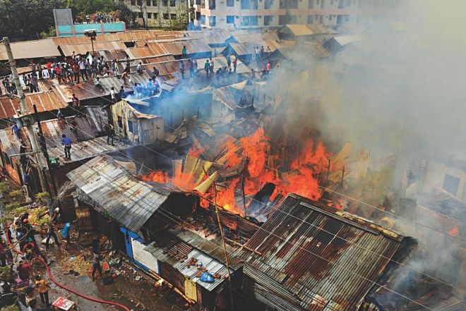 Fire broke out at a slum in Mirpur-2 of the capital yesterday afternoon. Photo: Amran Hossain/Courtesy 