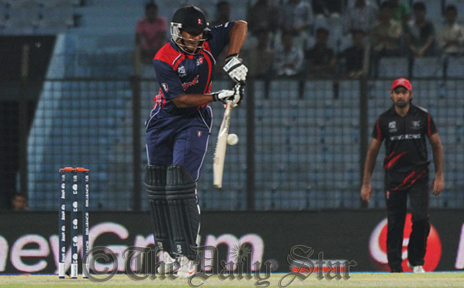 Nepal's top-scorer Gyanendra Malla glances a delivery on his 48-run innings against Hong Kong on the second match of World T20 at Chittagong stadium today. Photo: Anurup Kanti Das