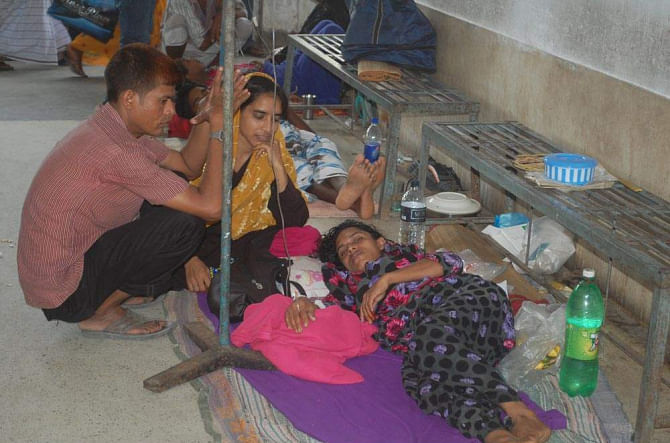 Patients lie on the floor of the diarrhoea ward at Pabna Medical College Hospital because of sudden influx of patients there after Eid. PHOTO: STAR