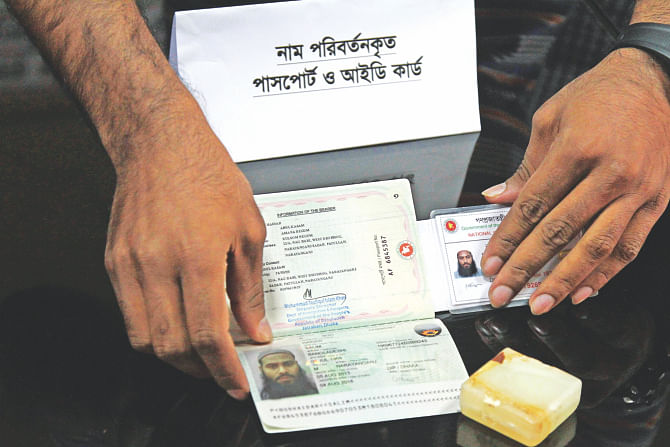 The forged passport and nat’l ID card of Huji leader Maulana Abu Bakar Siddique, a death row convict in Ramna Batamul carnage case, are being displayed at the Rab headquarters yesterday. Siddique was arrested early Wednesday. Photo: Sk Enamul Haq