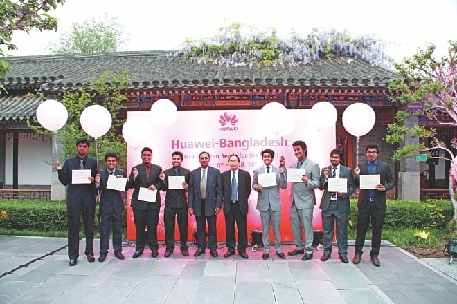 Winners of an apps developing contest in Bangladesh pose for photographs at a programme in Beijing recently. Photo: Huawei