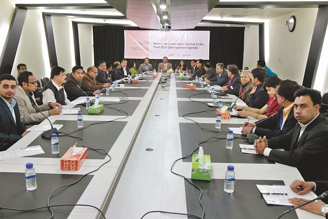 Analysts attend a roundtable on "Access to Information Central to the Post 2015 Development Agenda” at The Daily Star Centre yesterday. Photo: Star