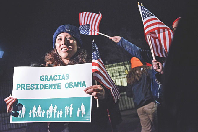 Immigration activists celebrate  outside the White House. Photo: AFP