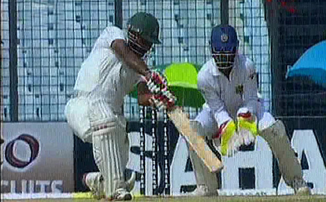 Imrul Kayes hammers a boundary on the off side as he, along with Mominul Haque, steadied Bangladesh after the early fall of both the openers. Photo: TV grab