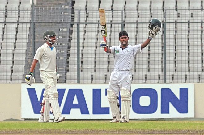 South Zone opener Imrul Kayes celebrates his double hundred against North Zone on the third day of the Bangladesh Cricket League final at SBNS in Mirpur yesterday. PHOTO: STAR 