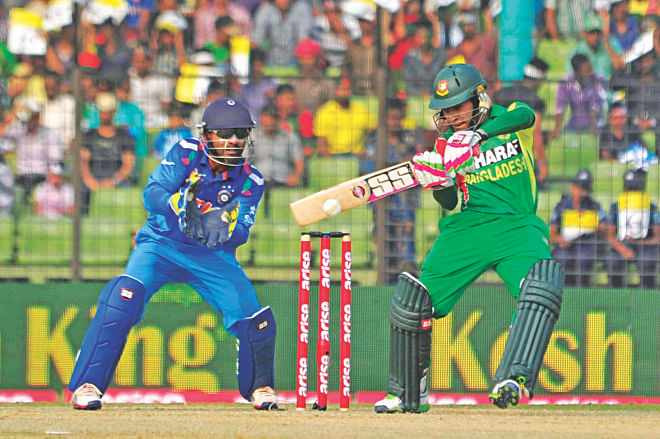 Bangladesh captain Mushfiqur Rahim goes on the back foot to cut one on his way to scoring a superb 117 against India in the Asia Cup at Fatullah yesterday. PHOTO: FIROZ AHMED