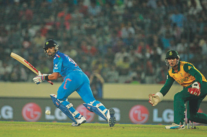 India superstar Virat Kohli sets off for a run during the second semifinal of the ICC World Twenty20 against South Africa at the Sher-e-Bangla National Stadium in Mirpur yesterday. Kohli was in marauding mood once again as he hit 72 not out off just 44 deliveries. PHOTO: FIROZ AHMED