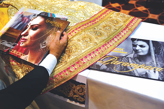 An embroidered piece of clothing is on display at a stall at an exhibition organised by the Synthetic and Rayon Textiles Export Promotion Council of India and the Indian High Commission at Sonargaon Hotel in Dhaka.  Photo: Star