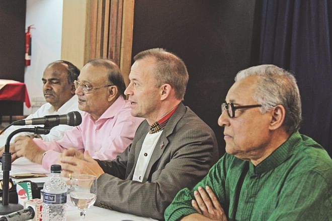 Second from right, Jyrki Raina, general secretary of IndustriALL Global Union, speaks at a press briefing at La Vinci Hotel in Dhaka yesterday.  Photo: Star
