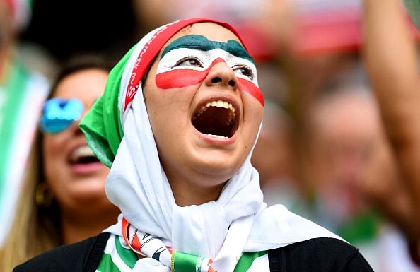 An Iran fan cheers during the 2014 FIFA World Cup Brazil Group F match between Bosnia and Herzegovina and Iran at Arena Fonte Nova on June 25, 2014 in Salvador, Brazil. Photo: Getty Images
