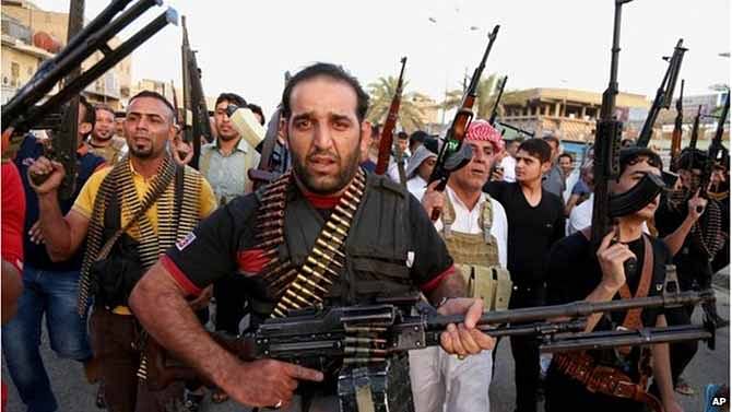 Iraqi Shia tribal fighters deploy with their weapons to help the military, 13 June 2014 They plan to help the military keep ISIS out of Baghdad