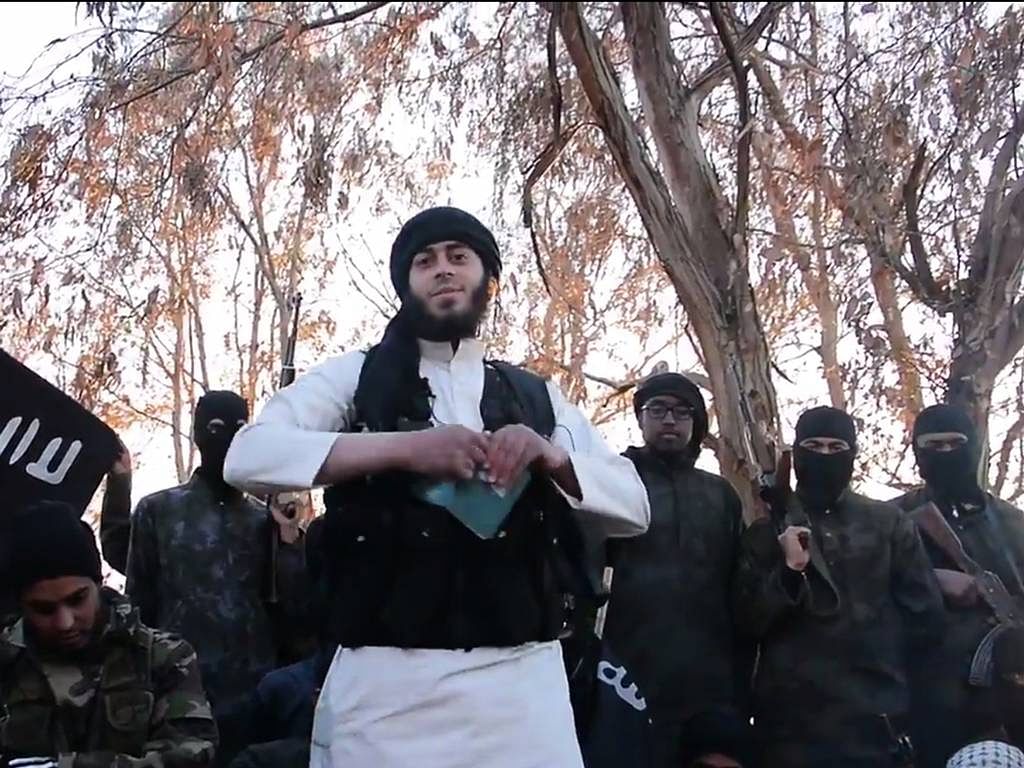 Isis Jihadists burn their passports. Photo: youtube.com
