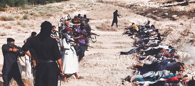Mass Execution: The picture allegedly shows militants of the Islamic State of Iraq and the Levant (ISIL) executing dozens of captured Iraqi security forces members at an unknown location in the Salaheddin province. A major offensive spearheaded by ISIL but also involving supporters of executed dictator Saddam Hussein has overrun all of one province and chunks of three others since it was launched on June 9. Photo: AFP