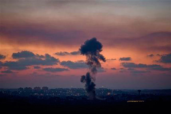 Smoke rises following an Israeli strike on Gaza, as seen from the Israel-Gaza Border, Tuesday, July 8. Photo: AP