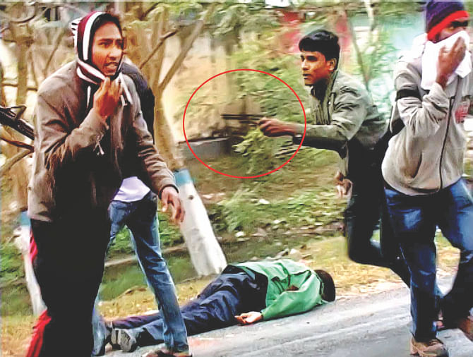 A gun-toting Shibir man runs to attack the other cop after neutralising one. Photo: Collected