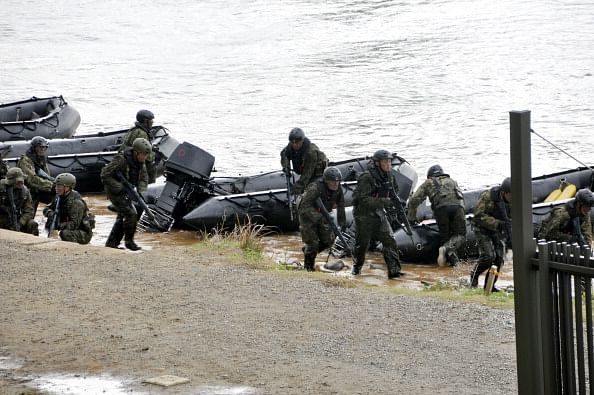 This file photo shows Japan Ground Self-Defense Force (JGSDF) members take part in a landing exercise in Nagasaki, Japan. Photo: Getty Images