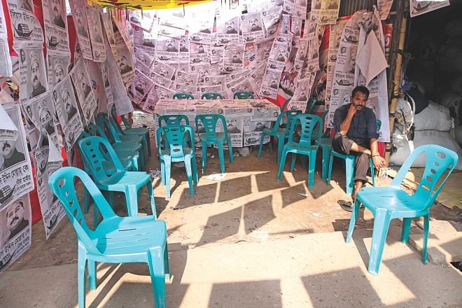 Only a day to go before the elections, the campaign camp of Awami League candidate Ilias Uddin Mollah yesterday was almost deserted as the runner was expected to win warding off the halfhearted challenge from fresh faces.  Photo: Palash Khan