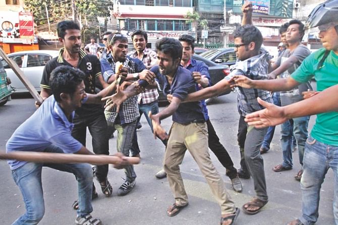 JCD dissidents beat up an activist loyal to the new committee. Photo: Amran Hossain