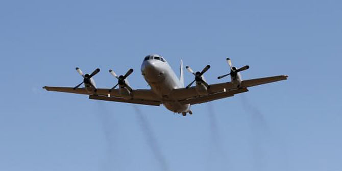 A Royal Australian Air Force P-3 Orion aircraft takes off from RAAF Base Pearce north of Perth March 21. Photo: Reuters 