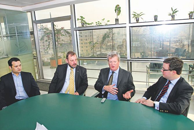 Second from right, ICA President Jordan Lea speaks during an interview with The Daily Star yesterday.  Photo: Star