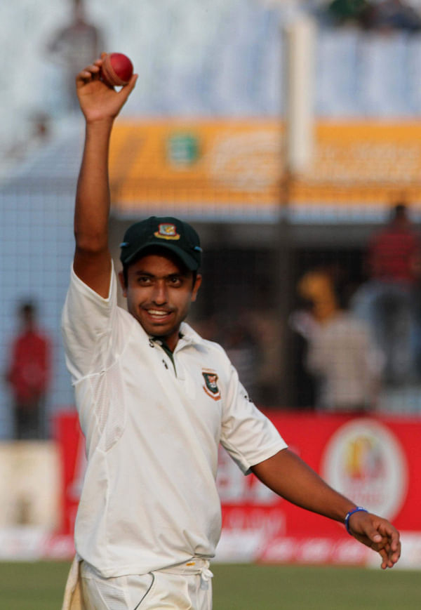 Leg-spinner Jubair Hossain holds the cherry after his maiden five-for skittled Zimbabwe out for 374 in the first innings on the third day of the third Test at the Zahur Ahmed Chowdhury Stadium in Chittagong yesterday. PHOTO: ANURUP KANTI DAS