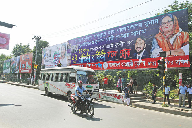 Jubo League leaders go into a self-promotion frenzy with the excuse of the youth body's 42nd founding anniversary.They occupy huge hoardings and put up banners, at Russell Square in the capital. Photo: Amran Hossain, Anurup Kanti Das