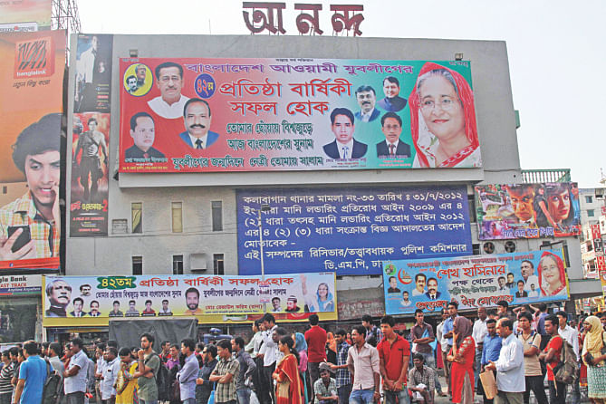 Jubo League leaders go into a self-promotion frenzy with the excuse of the youth body's 42nd founding anniversary.They occupy huge hoardings and put up banners, at Farmgate in the capital. Photo: Amran Hossain, Anurup Kanti Das