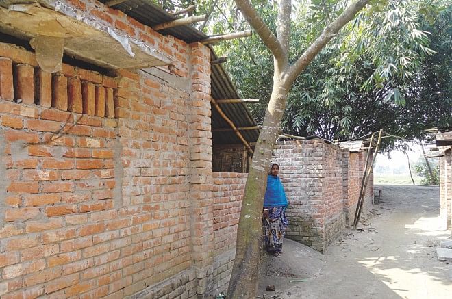 The house of Karuna Chandra Roy at Kornai Schoolpara of Kornai village in Dinajpur Sadar wears a deserted look as the owner along with family members migrated to India on Friday. PHOTO: STAR