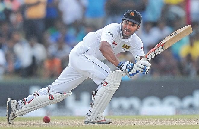 Sri Lanka's master batsman Kumar Sangakkara works the ball on the on side on the fourth day of the first Test against South Africa at the Galle International Stadium on Saturday. PHOTO: AFP