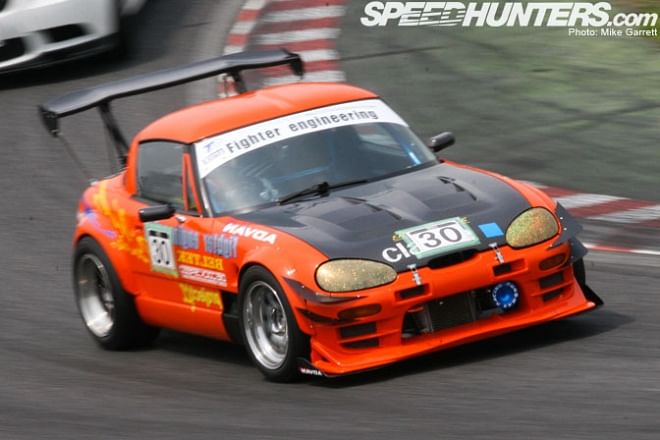 Kei-car race car. Say that fast, several times.  The Suzuki Cappuccino in action  