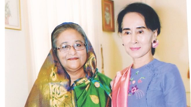 Prime Minister Sheikh Hasina shakes hands with Myanmar opposition leader Aung San Suu Kyi at the latter's parliament office in Naypyidaw, the country's capital, yesterday. The Bangladesh leader is now in the neighbouring Myanmar to attend the third summit of the Bimstec, a regional body of some countries in South Asia and South East Asia, today. Photo: PID