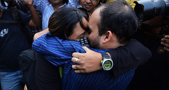An Indian couple in a 'Kiss of Love' demonstration last November. Hindu political parties have vowed to crack down on similar public displays of affection this Valentine's Day. Photo taken from BBC 