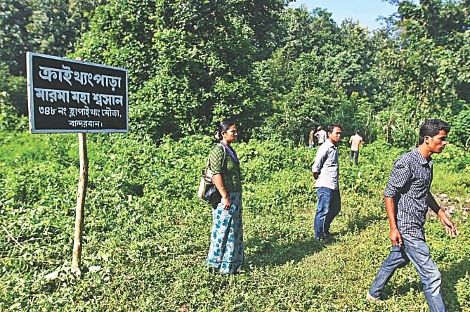 A signboard marks Krykhyongpara cremation ground which falls within the land that the BGB has fenced to build its Bandarban headquarters.  Photo: Anurup Kanti Das 