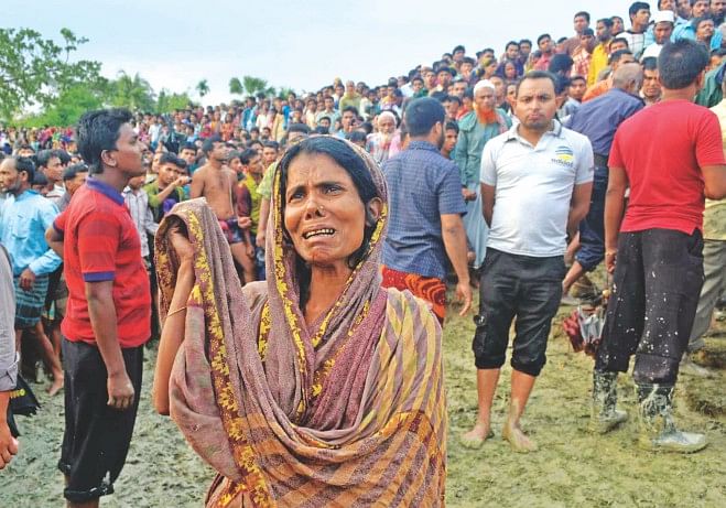 A woman wails over her loved ones missing or dead in the capsize of ML Shathil in the Golachipa river in Patuakhali yesterday. Photo: Banglar Chokh