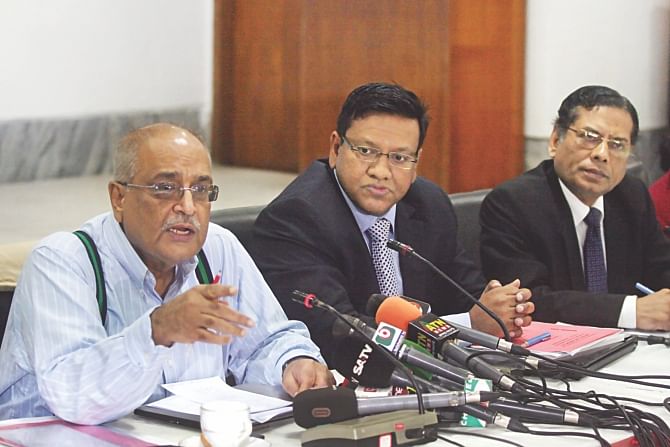 Left, Debapriya Bhattacharya, distinguished fellow of the Centre for Policy Dialogue, speaks at the launch of an LDC report at Cirdap auditorium in Dhaka yesterday. Right, Mustafizur Rahman, executive director of CPD, and Towfiqul Islam Khan, a research fellow, are also seen. Photo: STAR