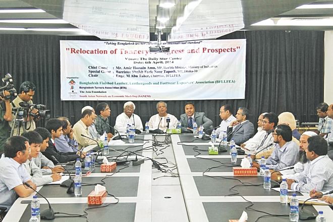 Industries Minister Amir Hossain Amu attends a roundtable -- Relocation of tanneries: progress and prospect -- at The Daily Star Centre in Dhaka yesterday.  Photo: Star