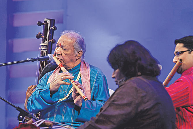 Legendary musician Pandit Hariprasad Chaurasia kept the audience spellbound with an early morning raga on his mystical flute at Bengal Classical Music Festival in Dhaka yesterday. Photo: Rashed Shumon