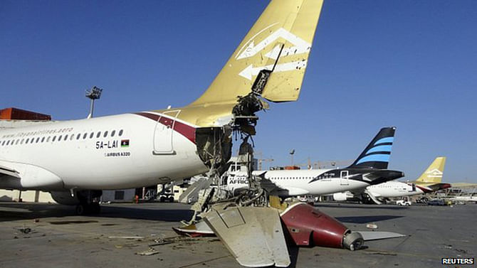 Damaged plane at Tripoli airport. 25 Aug 2014 Planes and buildings have been badly damaged by fighting at the airport