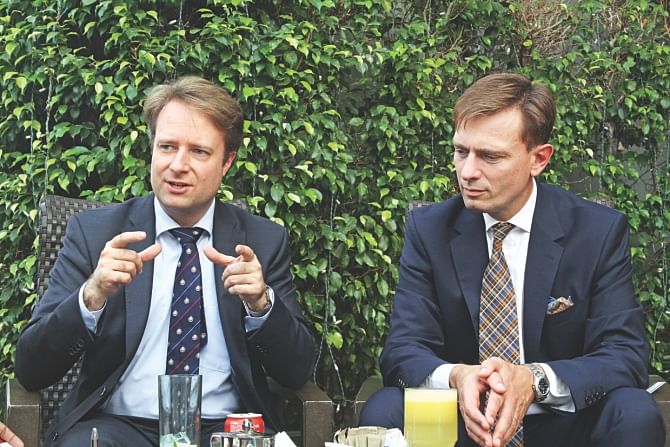 Left, Lorenz Berzau and Christian Ewert of Brussels-based Foreign Trade Association sit for an interview in Dhaka. Photo: Star 